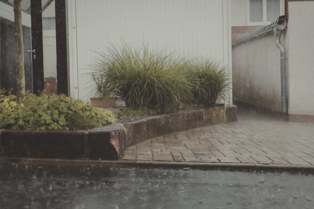 Invisible Drainage: How Trench Drains and Concrete Sloping Turn Your Driveway Into a Foundation Shield - Concrete Master